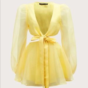 Yellow size large two piece set. The bottoms do have shorts in them